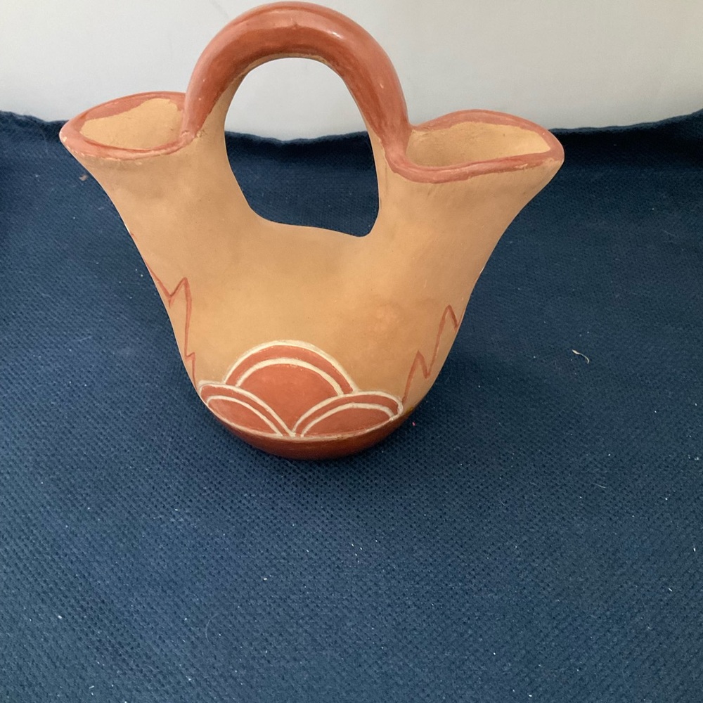 Brown and Tan Curved Sculpture Art Piece